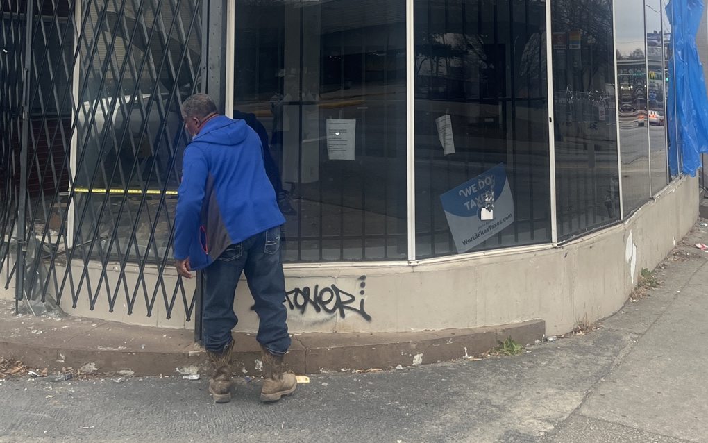 Atlanta commercial storefront needing exterior painting, window and building-surface repairs.